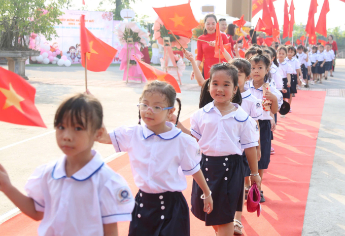 Học sinh trường Tiểu học Đại Thịnh A, Xã Đại Thịnh, huyện Mê Linh, Hà Nội trong ngày khai giảng năm học mới 2024-2025. Ảnh: Phạm Hùng