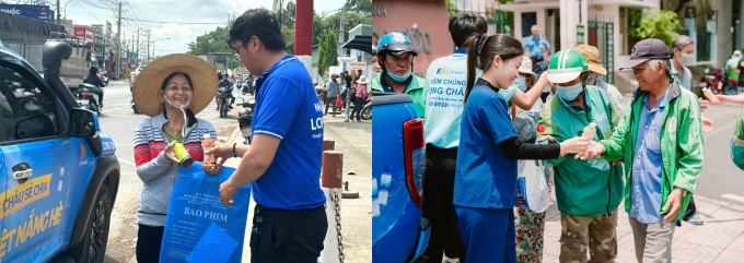 Người dân bắt tay, cảm ơn đội ngũ tiếp nước. Ảnh: FPT Long Châu