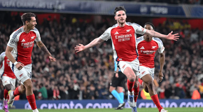Declan Rice mừng bàn trong trận Arsenal thắng Real 3-0 ở lượt đi tứ kết Champions League.